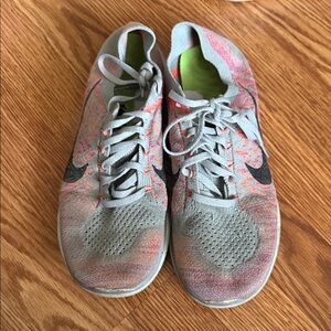 Nike Women’s Gray and Coral Knit Training Shoes